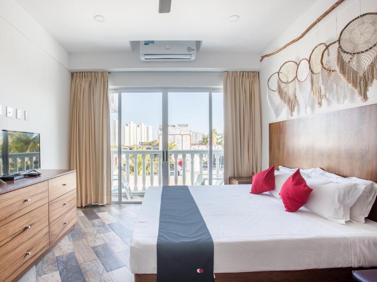 Capital O Cancun Ocean View, Cancun Exterior photo A bedroom at the hotel